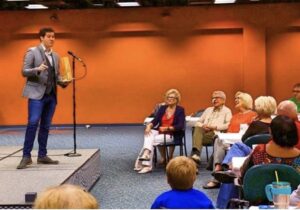 Bentley Burns performing an interactive magic show for an audience in Oxford, Mississippi
